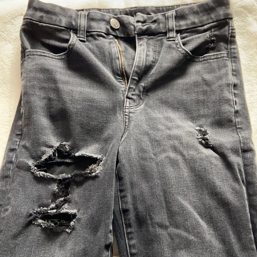 Black american eagle ripped skinny jeans